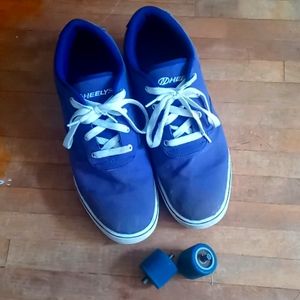 Purple Heelys with the wheels